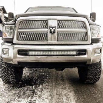 Grey Dodge Ram Pickup with 30 inch double row rider series light bar mounted in front bumper